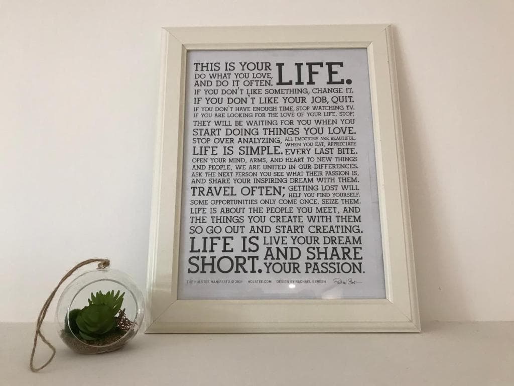 Framed print and a hanging glass terrarium